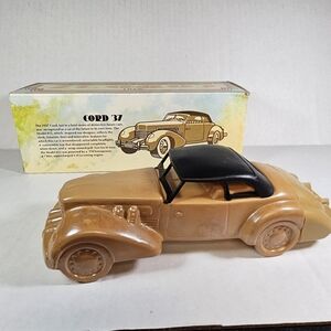 Avon  Cord 37 Car Bottle. Tan Tai Winds After Shave Bottle